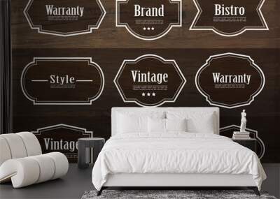 Set of vector vintage style frame labels and elements for design, carve banner on wood texture. Wall mural