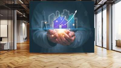 Real estate business concept, Man holding virtual screen of city hologram and growing business graph, Real estate economic growth analysis, The target of business. Residential development project. Wall mural