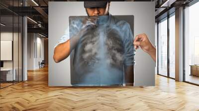 Man smoking with x-ray lung, Isolated on grey background Wall mural