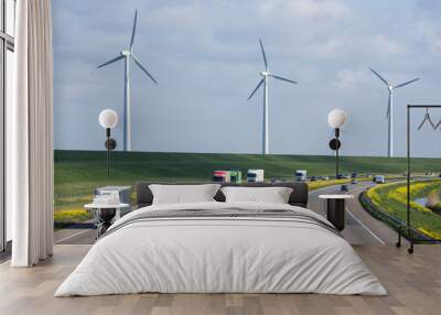 Dutch motorway near Lelystad with wind turbines and blooming rapeseed Wall mural