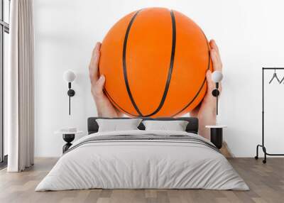 Two hands holding a basketball over white Wall mural