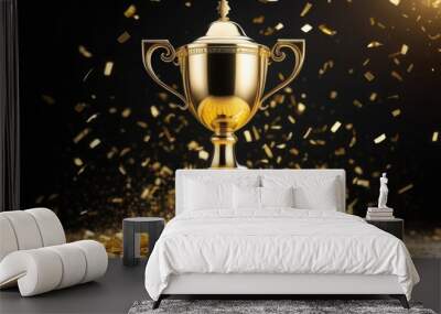 Gold cup on a black background with flying gold confetti. Awards concept. Wall mural