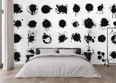 Set of abstract black ink splashes and blots on a white background. Vector collection of black paint splatters, grunge artistic effect. Ink stains and blotches textures Wall mural