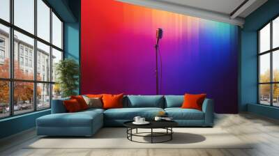 Microphone stands on stand on concert stage, rainbow fanfare in background Wall mural