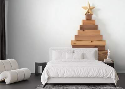 Christmas tree made of wooden planks on a white background Wall mural