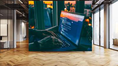 The code is on a laptop on a wooden table in front of the window  in the dark with a view of the lights of the night city, color lighting in the room, home decor	 Wall mural