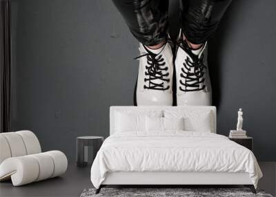 White female fashion white lace-up shoes on gray background. Women's shoes. Stylish white shoes. Fashion blog or magazine concept. Minimalistic shoe background. Urban style Wall mural