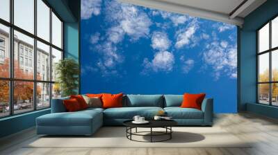 Beautiful patterns of clouds in the blue sky with free space for text. Wall mural