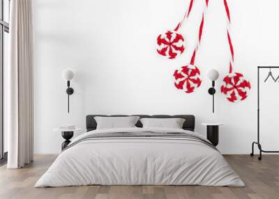 three knitted red white round candy caramel two pieces on white background Wall mural