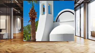 White church next to a palm tree Wall mural