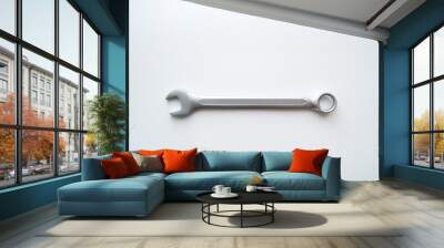 One steel combination wrench lies on a white background.  Repair tool. Wall mural