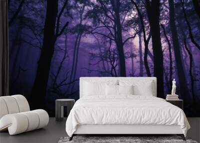 Mystical haunted forest with eerie fog and purple hues creating a spooky atmosphere Wall mural