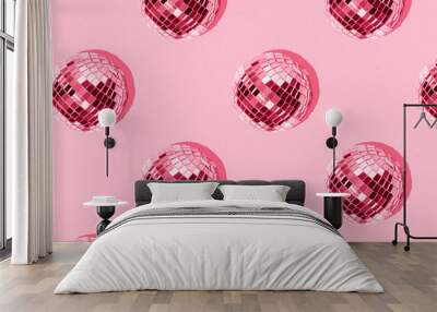 Seamless pattern with mirrored disco balls on a pink background. Image toned in the color of the year 2023 Wall mural