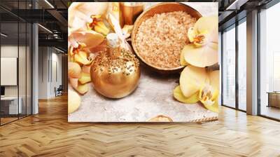 Golden spa concept with orchid, shells, sea salt. Top view. Wall mural