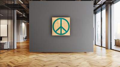 Symbol peace on wooden block over gray background, War, Boycott, Nuclear war, Hope, Economy Wall mural