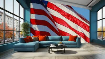 Close Up on American Flag Stars and Stripes Waving against Blue Sky Backlit by Afternoon Sun Wall mural