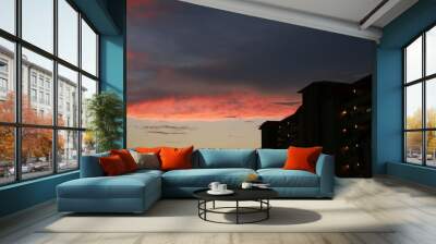 Reddish Orange Clouds over Condos after an Evening Rain in Pompano Beach, Florida Wall mural