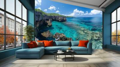 A panorama of a rugged coastline with dramatic rock formations, contrasting with the turquoise ocean Wall mural