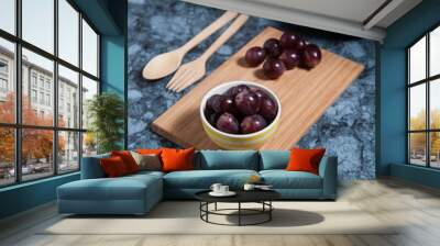 Fresh grape fruits on marble table. Flat lay. Wall mural