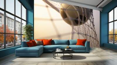 Soccer ball, scoring the goal and moving the net. Wall mural