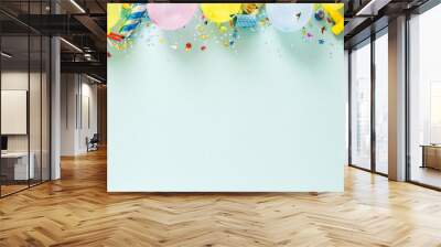 Flat lay decoration party concept pastel blue border top view Wall mural