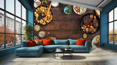 Frame of grilled steak, vegetables, potatoes, salad, snacks, homemade lemonade Wall mural