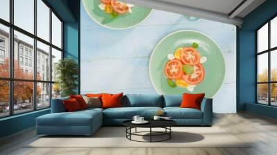 Italian salad tomatoes mozzarella cheese with white wine, top view Wall mural