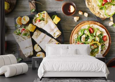 Roll tortilla with grilled chicken fillet and grilled vegetables Wall mural