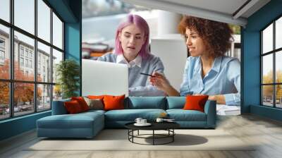 Smiling Business people teamwork in meeting, Smiling African American businesswoman and Caucasian coworker working over laptop sitting in a modern office Wall mural