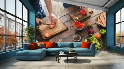 Top view couple cooking together delicious and healthy dinner Wall mural