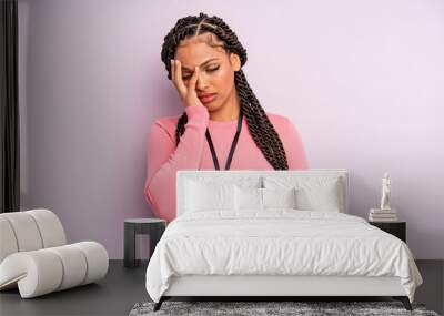 black afro woman feeling bored, frustrated and sleepy after a tiresome. acreditation vip card Wall mural