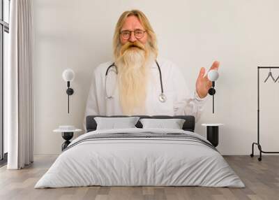 cool senior man feeling happy, surprised realizing a solution or idea. crazy doctor concept Wall mural