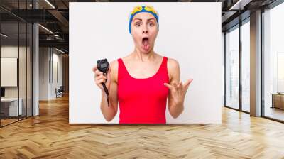 young pretty woman  feeling extremely shocked and surprised. swimmer with a timer Wall mural