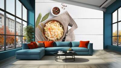 fermented cabbage in wooden bowlon white table with copy space Wall mural