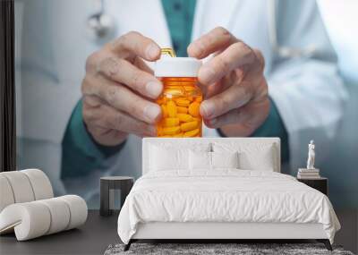 A detailed view of a pharmacists hands filling a generic syrup medication bottle according to a script Wall mural