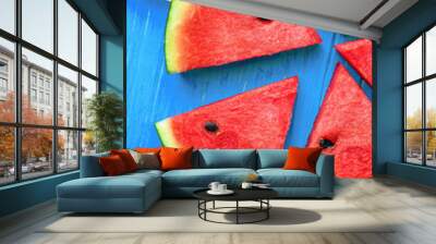 Watermelon slice popsicles on a blue rustic wood background, Pop Wall mural