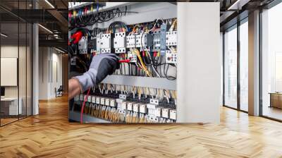 Electricity and electrical maintenance service,Electrical tests industrial electrical circuits with a multimeter in the control terminal box. Wall mural