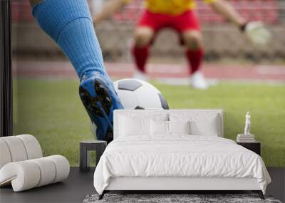 soccer player running with ball Wall mural