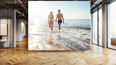 loving couple on the beach Wall mural