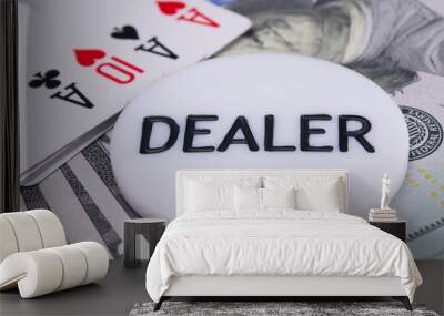 against the background of dollar bills and card layout, close-up of dealer chips, for playing poker Wall mural