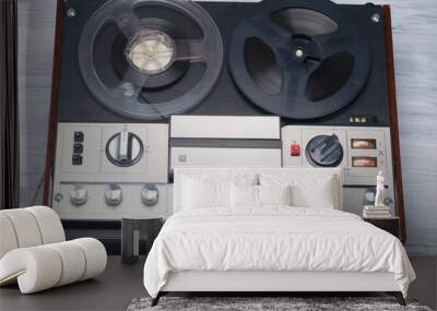 On the table lies an old magnetic tape player of retro hits, music Wall mural