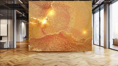 Orange and gold pattern with texture of geode and sparkles. Abstract vector background in alcohol ink technique. Modern paint with glitter. Template for banner, poster design. Fluid art painting Wall mural