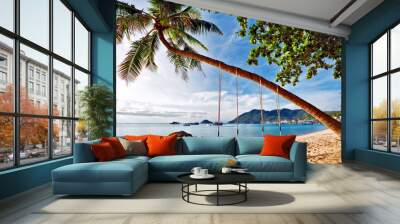 Swings on the tropical beach. Wall mural