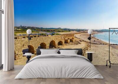 The aqueduct. Mediterranean sea beach. Wall mural