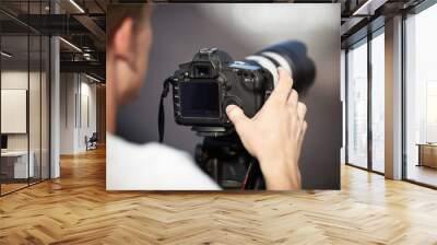 photographer with telephoto lens Wall mural