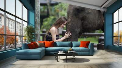 Model woman hugging a big elephant Wall mural