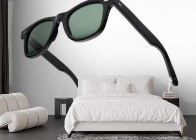 Black plastic sunglasses isolated on white. Wall mural