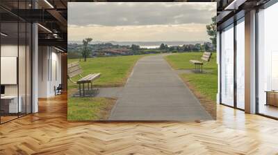 two benches facing each other Wall mural