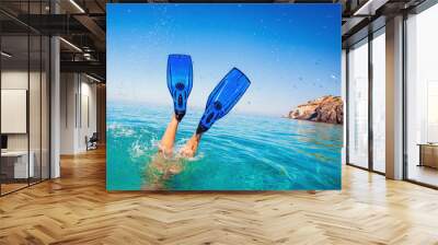 Flippers in water. Diver fins. Active vacation at sea. Diving. Wall mural