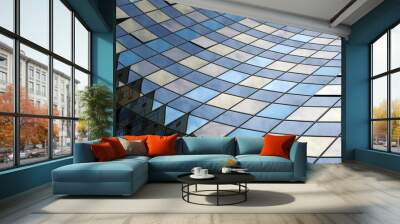 Perspective view of the modern glass building facade with reflections on the windows. Architectural pattern Wall mural